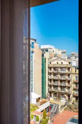 a view of a city from a window at Stay U-nique Apartments Rambla Catalunya V in Barcelona