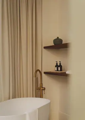 a bathroom with a tub and a shower curtain at Casa Llimona Hotel Boutique in Barcelona