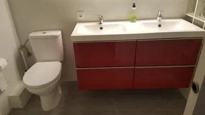 a bathroom with a white toilet and a sink at Apart 2 beds 1 sofabed downtown 31 nigths min Barcelona in Barcelona