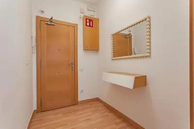 a bathroom with a sink and a mirror at Ola Living Sagrada Familia in Barcelona