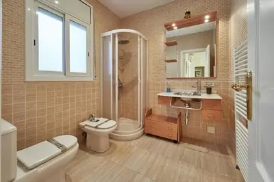 a bathroom with a toilet sink and a shower at Villa lluna en Olivella, Sitges, Barcelona in Olivella