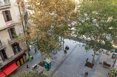 an overhead view of a city street with trees at Central & Fully Equipped Apartment in Eixample Next to Metro, Sleeps 5 in Barcelona