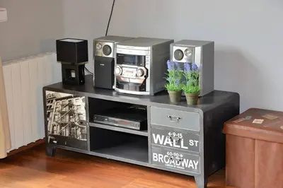 a black shelf with speakers and a radio on it at Villa Sitges El Olivo High Comodity AC Pool Heated 30º Optional Real Garden Pool XXL 10 min drive from Sitges in Olivella