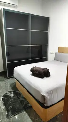 a bedroom with a bed with a towel on it at Beautiful Appartment in Martorell (Barcelona) in Martorell