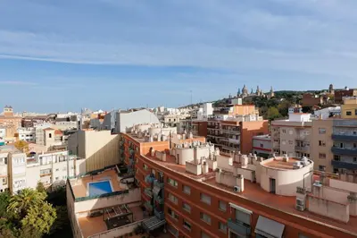 an aerial view of a city with buildings at Stylish Apartment near Plaça España in Barcelona