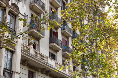 an apartment building in paris with balconies at Stylish Apartment near Plaça España in Barcelona
