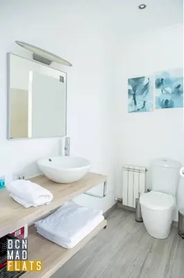 a bathroom with a sink and a toilet at Bcn - Poble Nou in Barcelona