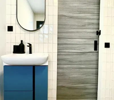 a bathroom with a sink and a mirror at Casa Brisa Boutique Guest House - Gay Men Only in Sant Pere de Ribes