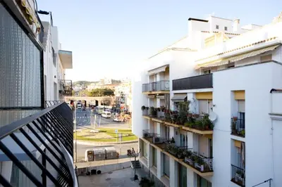 a view from the balcony of a building at Hola! - Sitges Centric Apartment in Sitges