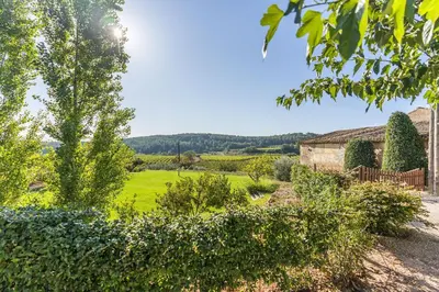 a view from the garden of the property at Finca Can Romeu: alojamiento rural entre viñedos in Font-Rubí