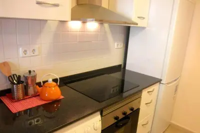 a kitchen with a tea kettle on a counter at Piquer con Terraza in Barcelona
