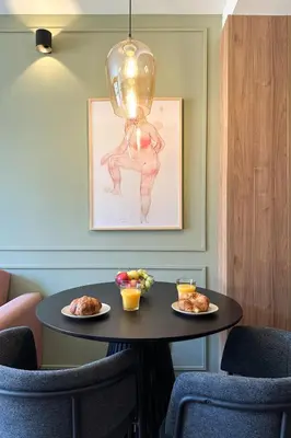 a table with two plates of food on it at Boutique Design Apartments & Studios in Barcelona