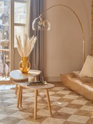 a living room with a table and a couch at Boutique Pare Lainez in Barcelona