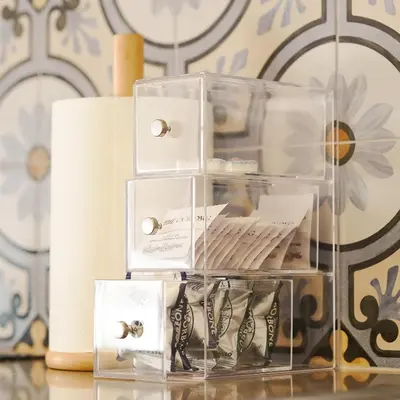 a glass box with engagement rings on a table at Boutique Pare Lainez in Barcelona