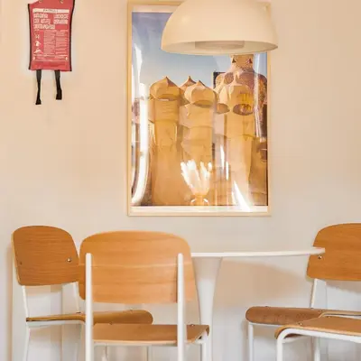 a dining room with a table and chairs at Boutique Pare Lainez in Barcelona