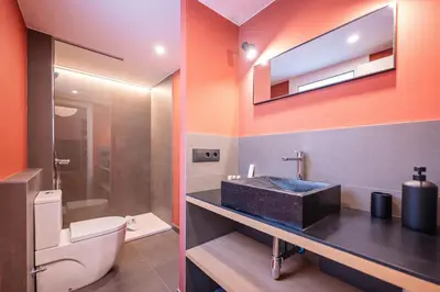 a bathroom with a sink and a toilet at Sweett - Ethnic Eixample in Barcelona