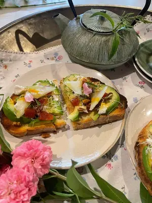 two slices of pizza on a plate on a table at L'ESTABLE DE CAN TABERNER in Bigues i Riells