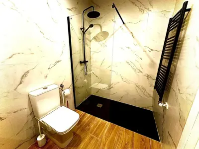 a bathroom with a shower and a toilet and a shower at jacuzzi privado con vistas increíbles el Raco d Artes in Artés
