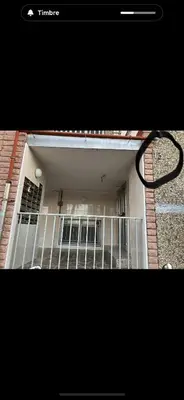 a picture of a building with a gate on it at Habitaciones cerca del centro de Barcelona, Barceloneta, Aeropuerto y Fira in Hospitalet de Llobregat