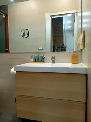 a bathroom with a sink and a mirror at Bonavista Montgat in Montgat