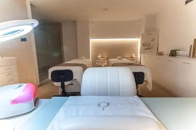 a room with a row of chairs in a clinic at Hotel Sorli Emocions in Vilassar de Dalt