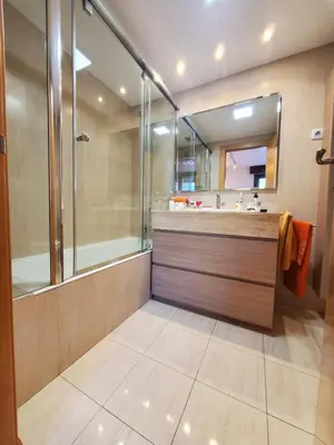 a bathroom with a shower and a sink at Habitacion con Piscina in Sant Cugat del Vallès