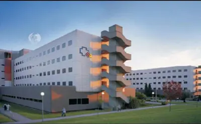 a large white building with a building at Habitacion con Piscina in Sant Cugat del Vallès
