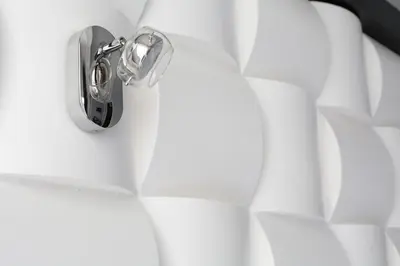 a door knob on a white wall at Amra Barcelona Gran Via in Barcelona