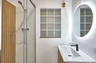 a bathroom with a sink and a shower at BBarcelona Sagrada Familia Garden Apartment in Barcelona