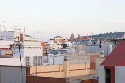 a view of a city from the roofs of buildings at YOUR HOME- Apartment Camp Nou 1 in Hospitalet de Llobregat
