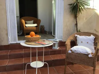 a living room with a table and two chairs at 1201 - Encantador Apartamento en Poble Nou in Barcelona