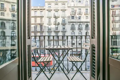 a view from a window of a table and chairs at Anton's Downtown Apartment in Barcelona
