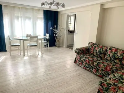 a living room with a couch and a table at Puig comfort in Calella