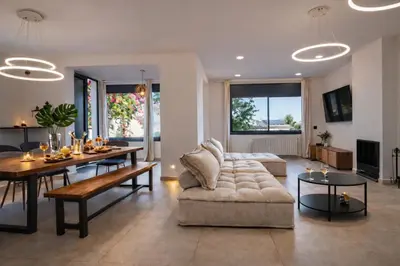 a patio with a couch and a swimming pool at Villa privada para grupos grandes cerca de Sitges Piscina terrazas y naturaleza in Olivella