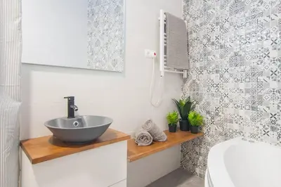 a bathroom with a sink and a toilet at Dega Sagrada Familia in Barcelona
