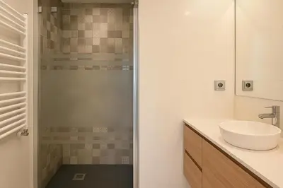 a bathroom with a sink and a shower at Apartamento en la playa de Castelldefels ( Barcelona) in Castelldefels