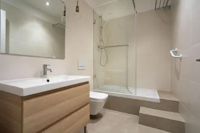 a bathroom with a sink and a toilet and a shower at Loft estilo industrial en Esplugues - 15 min de Barcelona in Esplugues de Llobregat