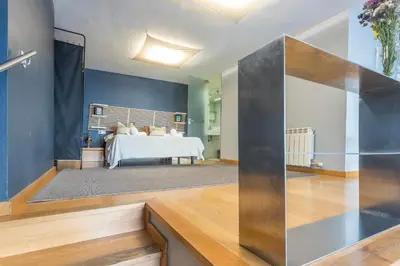 a bedroom with a bed in a room at My Space Emirates - Bright Apartment in Gracia with shared Pool in Barcelona