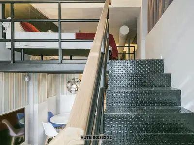 a staircase in a house with a bunk bed at Alcam Futbol Pequeño in Barcelona