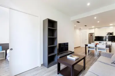 a living room with a couch and a table at 2513 - AB Comte dUrgell II-I in Barcelona