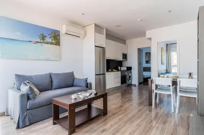 a living room with a couch and a table at 2514 - AB Comte dUrgell V-II in Barcelona