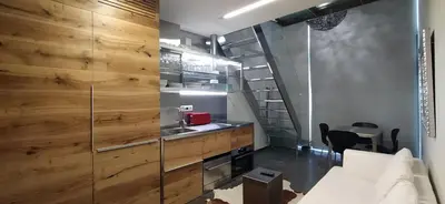 a bathroom with a counter and a sink in a room at My Space Emirates - Fully equipped apartments near the Beach with shared pool in Barcelona