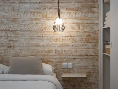 a bedroom with a wooden wall with a bed and a light at ´Vicens Gem´ Private terrace HS Wi-Fi in Gracia by MyRentalHost in Barcelona