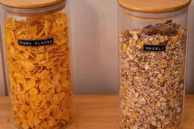 two glass jars filled with different types of granola at Verdi 254 in Barcelona