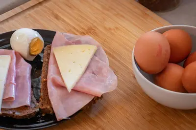 a sandwich and eggs and a bowl of eggs at Verdi 254 in Barcelona