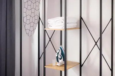 a room with black and white walls and shelves at Stay U-nique Apartment Rossello II in Barcelona