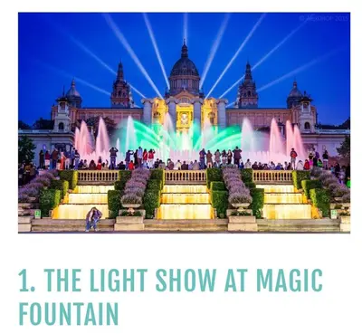 a light show at magic fountain in front of a building at Casa dess in Hospitalet de Llobregat
