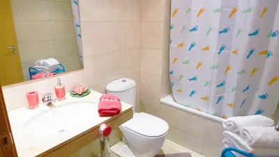 a bathroom with a sink and a toilet and a shower at ALEXANDRA´s BEACH-PORT in Badalona