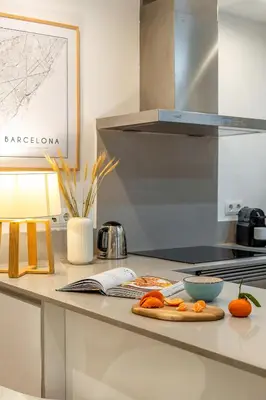 a kitchen with a counter with some food on it at Canela Homes BARCELONA FLORIDABLANCA in Barcelona