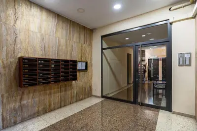 a hallway with a wine rack on a wall at Canela Homes BARCELONA SEPULVEDA in Barcelona